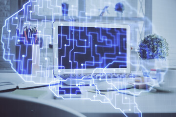 Double exposure of work space with computer and human brain drawing hologram. Brainstorm concept.