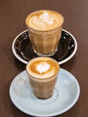 Closeup of a Glass of Coffee Latte on a wooden table in a Sydney Cafe