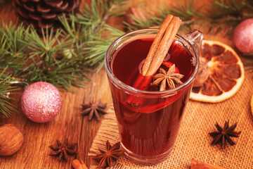Christmas mulled wine. Merry Christmas. Glass of mulled wine with cinnamon and anise, top view....