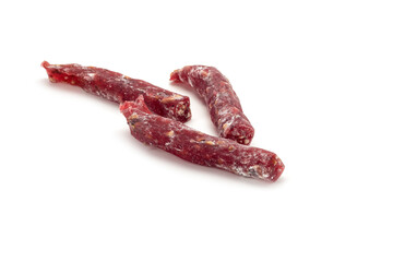 Churchkhela, juice with nuts on a white background with shadows