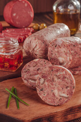 Slices of white pudding on cutting board - Morcela branca