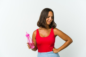 Young latin woman holding a milkshake isolated on white background