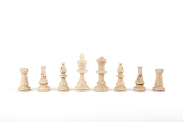 row of chess pieces on white background