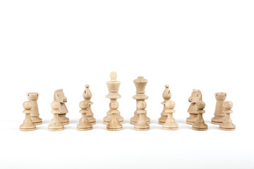 row of chess pieces on white background