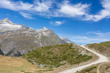 Majestic beautiful mountains view on Swiss Alps, hiking path, beauty of fresh green nature, Switzerland