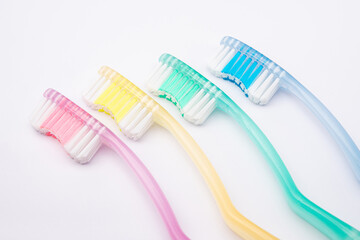 Set of toothbrushes for a family of four isolated