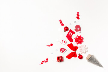 Christmas sale. Stocking, gifts, winter tree, ribbon and bow in Christmas composition on white background for greeting card. Copy space. Winter holidays, New Year.