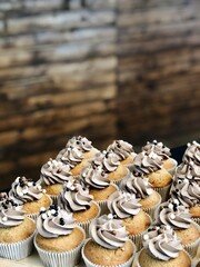 muffins with cream on top