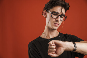 Close up of a young teenage boy wearing glasses