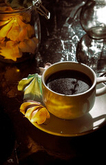 Retro a cup of coffee and a few meringues on black background. Great design for any purposes.