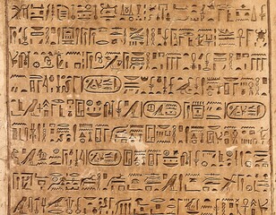 Egiptian hieroglyphs carved in sandstone