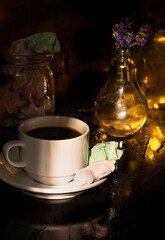 Retro a cup of coffee and a few meringues on black background. Great design for any purposes.