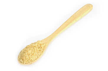 Brown sugar in wooden spoon on white background
