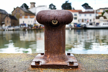 An old rusty murray in a seaside town in France.