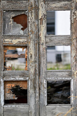 Old, dilapidated wooden door. Old, dilapidated wooden door.
