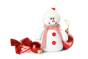 Cute snowman toy, candies and red Christmas balls isolated on white
