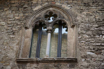 Window in an ancient palace of the city of Narni