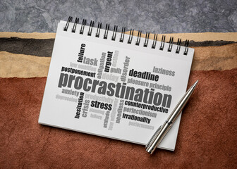 procrastination word cloud in a sketchbook against abstract paper landscape, productivity and personal development concept