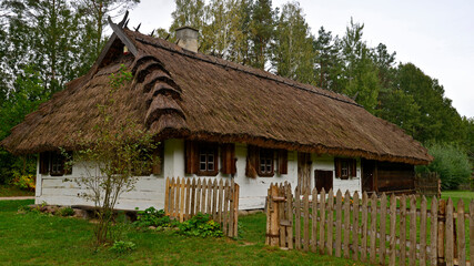 Fototapeta na wymiar a Belarusian cottage from the mid-19th century, currently standing in the village of Wąsilków in Podlasie, Poland October 2020