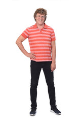 Fototapeta premium full portrait of a man with curly hair and white background, hand on hip