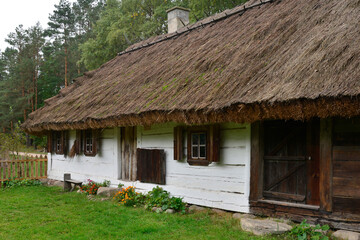 Fototapeta na wymiar a Belarusian cottage from the mid-19th century, currently standing in the village of Wąsilków in Podlasie, Poland October 2020