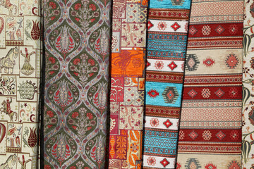 Persian carpet and rugs in Turkey. Oriental moroccan rugs hanging on the market. 