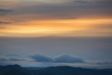 Windmills under sunrise