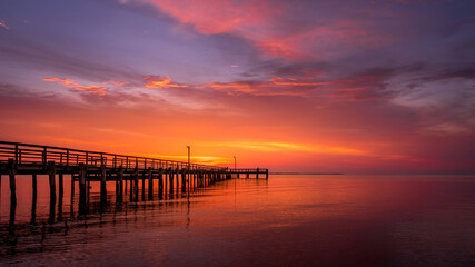 Fototapeta na wymiar Sunrise Over Pier