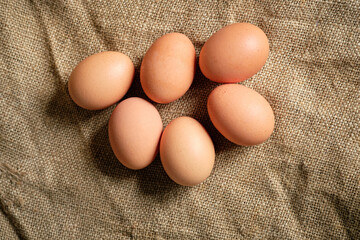 Brown eggs on sackcloth