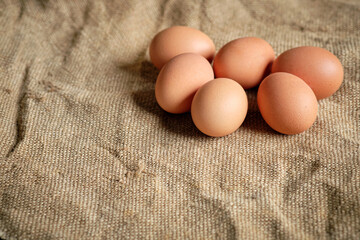 Brown eggs on sackcloth