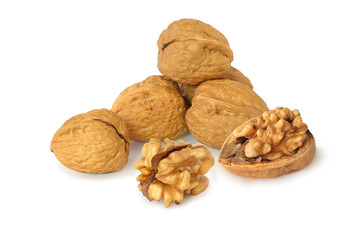 Several whole walnuts, core and uncovered walnut isolated on the white