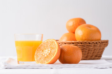 Fresh orange fruit on white background