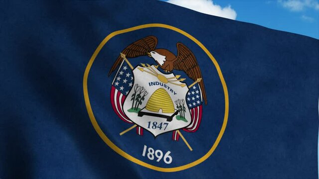 Utah flag waving in the wind, blue sky background. 4K