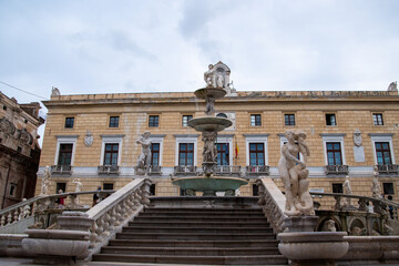 Fototapeta na wymiar The Praetorian Fountain (Italian: Fontana Pretoria) is a monumental fountain of Palermo., Sicily, Italy