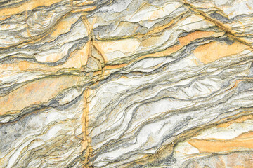 Rock layers - a colorful formations of rocks stacked over the hundreds of years. Interesting background with fascinating texture