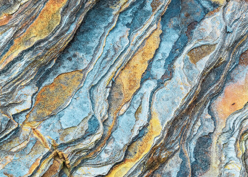 Rock layers - a colorful formations of rocks stacked over the hundreds of years. Interesting background with fascinating texture