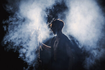 Obraz premium Sorcerer with marks on his body in the forest