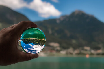 Crystal ball alpine landscape shot at the famous Achensee, Pertisau, Tyrol, Austria