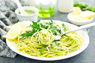 Spaghetti with arugula pesto. Selective focus.