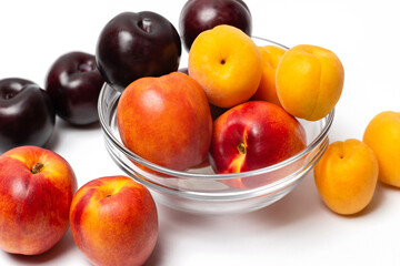 Naklejka na ściany i meble nectarine, peach and plum on a white background