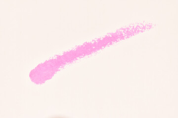 Pink cosmetic lipstick smear isolated light background color. Swatch lipstick.