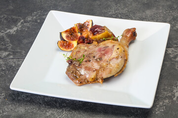 Roasted. duck. leg with plum and apple