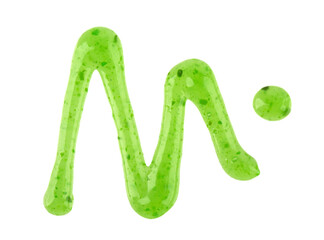 Kiwi jam drizzle isolated on white background. Splashes of green jam. Top view.