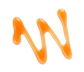 Maple syrup drizzle isolated on white background. Splashes of sweet maple syrup. Top view.