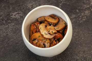 Roasted champignon with herbs and spices