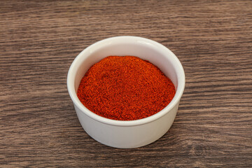 Dry paprika powder in the bowl