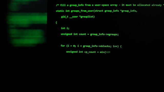 Modern tech. Program development and blockchain concept. Developer working on program codes in office. Shallow depth of field bokeh, selective focus effect. Hacking or protection data