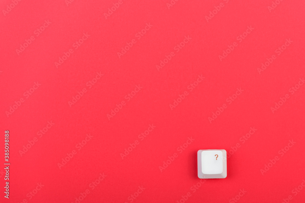 Fototapete keyboard key with question mark isolated. white keyboard key on red background. top view. close up