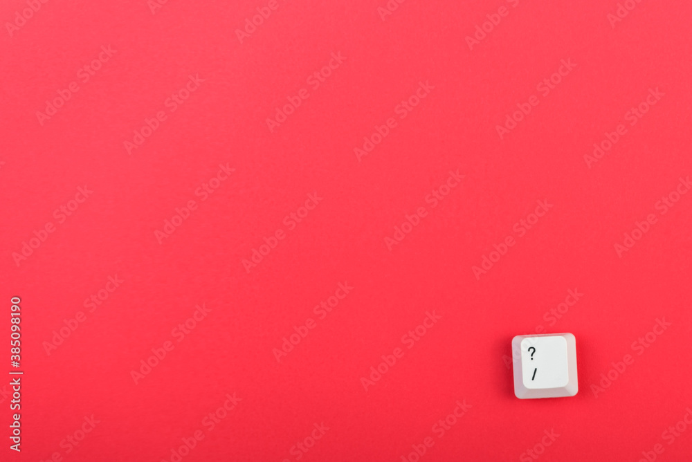 Fototapete keyboard key with question mark isolated. white keyboard key on red background. top view. close up