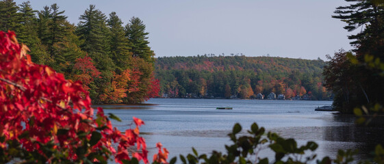 Foliage and boat on Wilson Lake - Acton, Maine.